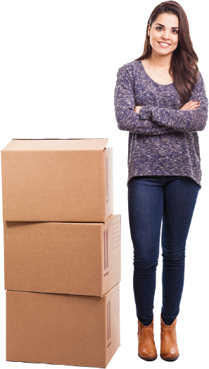 photo of a smiling girl standing next to a stack of three boxes